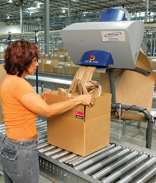 The first of two machines that dispense crumpled kraft paper to fill voids was added to meet the needs of an educational publish