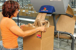 The first of two machines that dispense crumpled kraft paper to fill voids was added to meet the needs of an educational publish