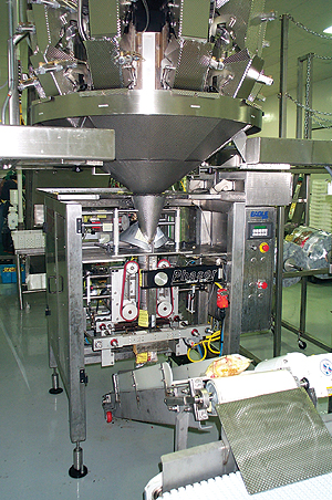One of three baggers inside Crunch Pak's cold room packs a range of sizes including its most popular item, a 1-lb zippered bag