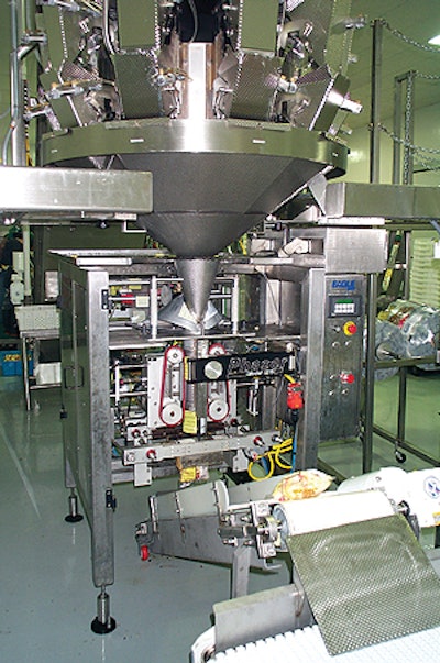 One of three baggers inside Crunch Pak's cold room packs a range of sizes including its most popular item, a 1-lb zippered bag