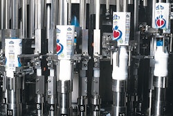 Sealed with foil lids, bottles emerge from the aseptic filling system in two parallel lanes (left). Colorful shrink-sleeve label