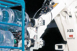 The first robotic loader (top right) for workplace water bottles was installed at Neverfail's Thornleigh plant.