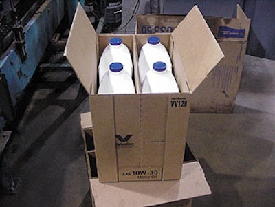 With its center support and double-wall corners, the H-bliss-style box (above) was perfect for Valvoline's offset-neck bottle (b