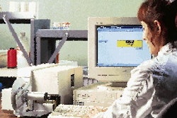 An operator inputs the label information into a computer and prints out the labels.