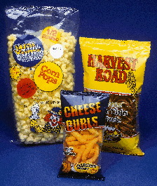 Cross-feed conveyors receive product from a distribution conveyor for direct delivery to the combination scales. Shown here is t