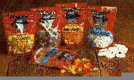 Film unwinds from left to righton this horizontal rotary form/film/seal machine. The machine produces about 60 pouches/min. A sa