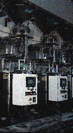 Each vf/f/s machine is paired with a volumetric cup filler to crank out bags of berries at about 40/min