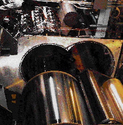 PC Materials uses vacuum chamber coating equipment in its low-temperature plasma coating process. Here the substrate is visible