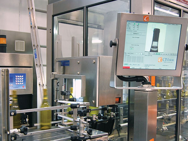 VIVID VISUALS. Large touch-screen display lets operators view and zoom in on each inspection image.