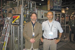 ICA's Gregg Pascoe and Dr. Giulio Evangelisti at the SCAA conference with the high performance CSV40 Paket bagging systems sold