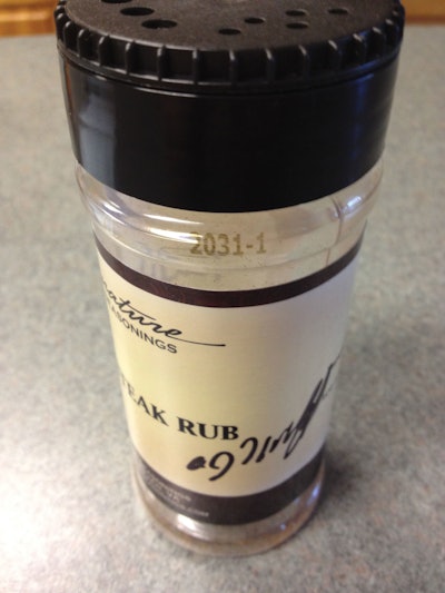 Codes are imprinted on the sidewall near the top of the PET bottles.