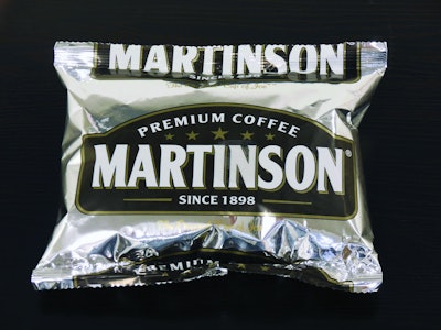 The one-way valve has a tri-layer construction. As CO2 released by the packaged coffee beans builds up, the gas enters and then escapes through the valve’s top baffle layer. The valve then automatically reseals to prevent oxygen from entering the bag.
