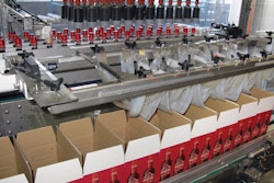 GANTRY PACKER. Among the new pieces of equipment in Line 1 is the top-loading gantry case packer.