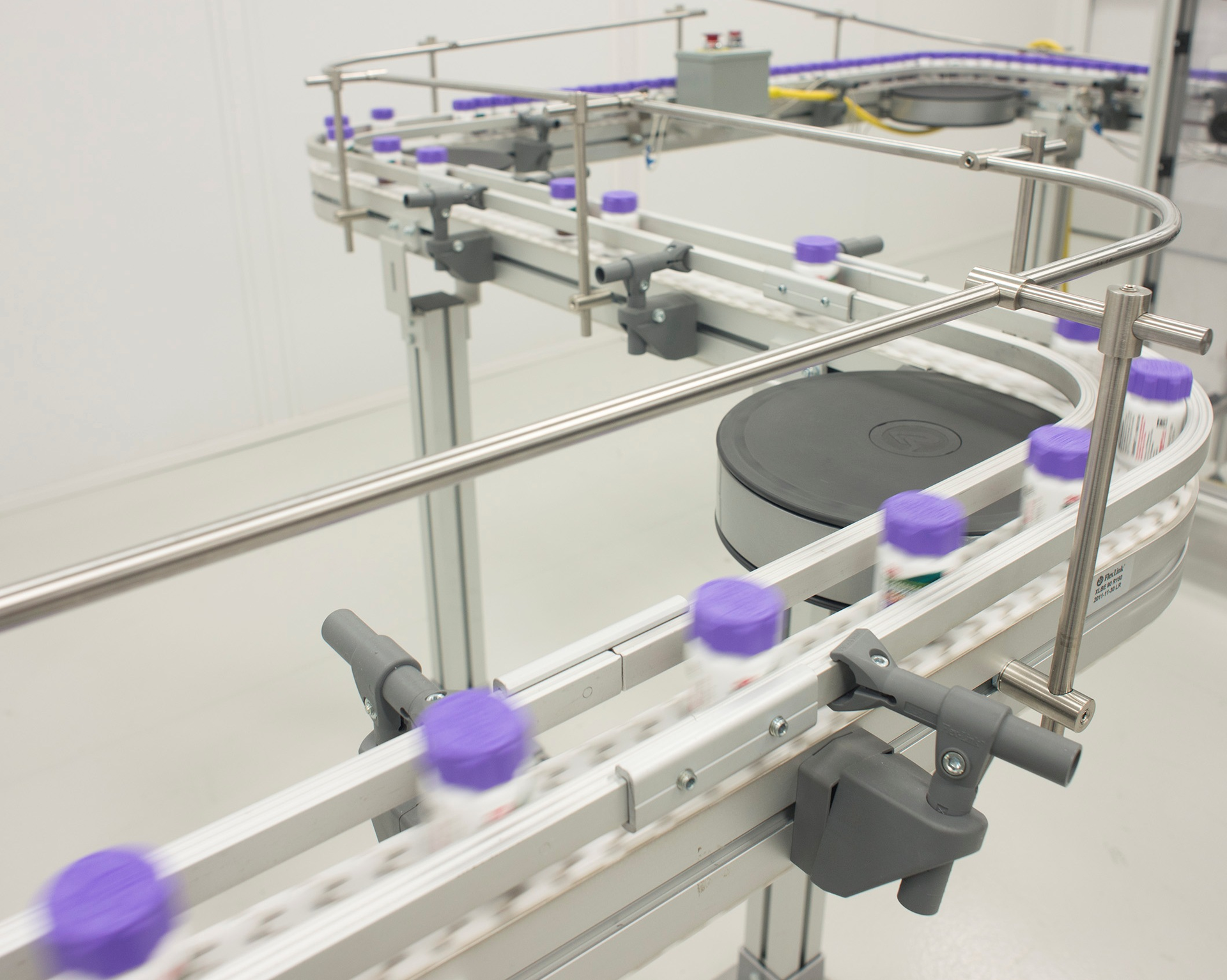 Reed-Lane expands warehouse capacity by 30% and adds new 48-slat bottling machine.