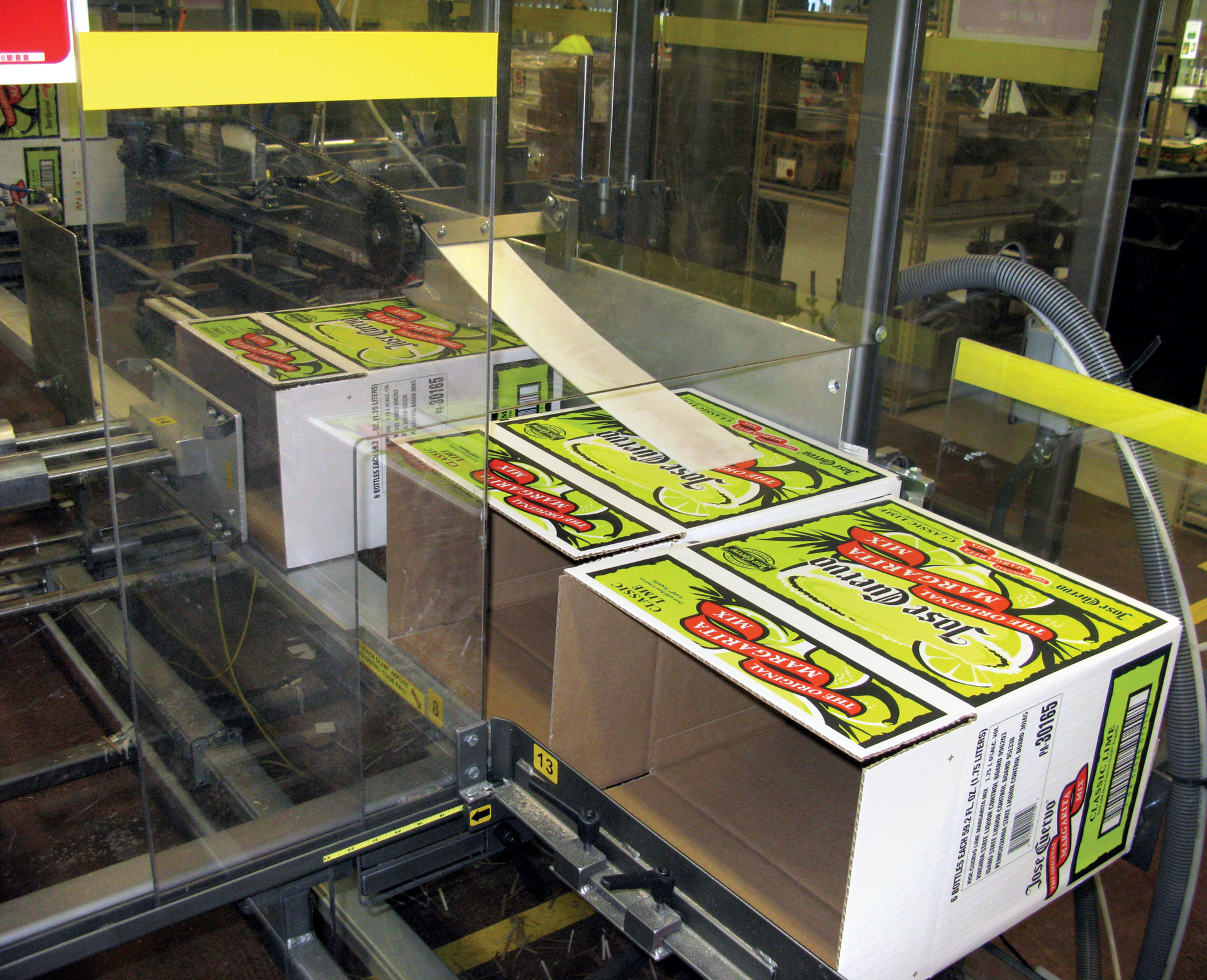 CASE PREP. Once cases are erected, they are sent to a partition inserter.