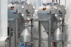 One pressurized Centri-Sifter centrifugal sifter is dedicated to screening of white flour—the other for screening of whole wheat flour. Photo: Kason Corporation.