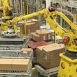 Robots palletizing cases of cheese have been decorated by Sargento with Swiss-hole decals to ‘cheesify’ them.