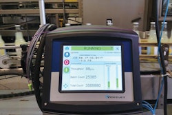 The closely coordinated system accurately delivers date codes and bar codes to bottles, shipping cases, and pallets.