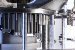 Gerolsteiner Brunnen places deduster upstream of its inspection equipment to keep potential foreign bodies from entering PET preforms prior to stretch blow-molding.