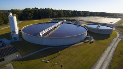 Sanderson Farms’ Kinston, N.C., facility’s wastewater treatment system consists of an anaerobic lagoon, activated sludge system, ultra-violet disinfection and a land application system that sprays effluent water onto hay fields and forest land. Photo cour