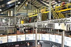 A high-level depalletizer single files and feeds bottles into a lowerator on their way down the line. Many of the equipment suppliers represented in the line are located near the brewery’s Richmond, VA, location.