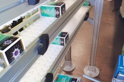 A series of pneumatic stops, escapements, and right-angle pushers ensure that cartons are released onto the trunk line at the right time.