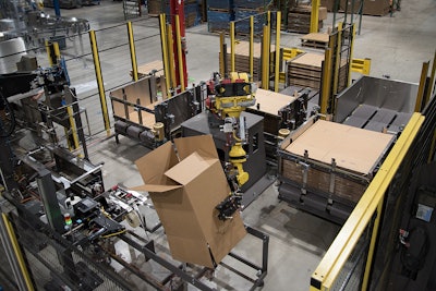 For case erecting and sealing, the robot’s end effector lifts open a case before presenting it to the bottom tape operation.