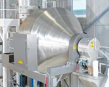 Upon discharge, the 140-cu.-ft.-capacity rotary batch mixer evacuates completely with little or no residual, allowing fast, thorough cleaning between batches. Photo courtesy of Munson Machinery.