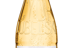 Popular beverage in Poland gains a new look while also reducing bottle weight by about 10%.