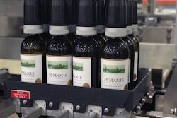 The case packer uses these pick heads to pick bottles and deposit them into a waiting case.