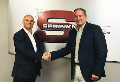 Krones President and CEO Holger Beckmann and W.M. Sprinkman President Brian Sprinkman