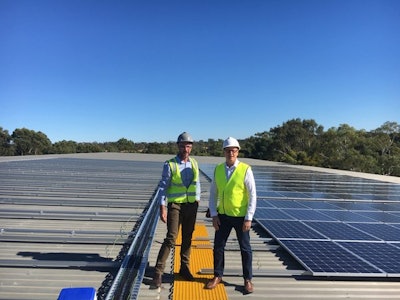 Pernod Ricard sustainability managers on roof of Rowland Flat winery
