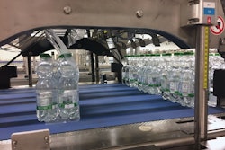 This multipacker collates bottles into groups of 18 bottles each.