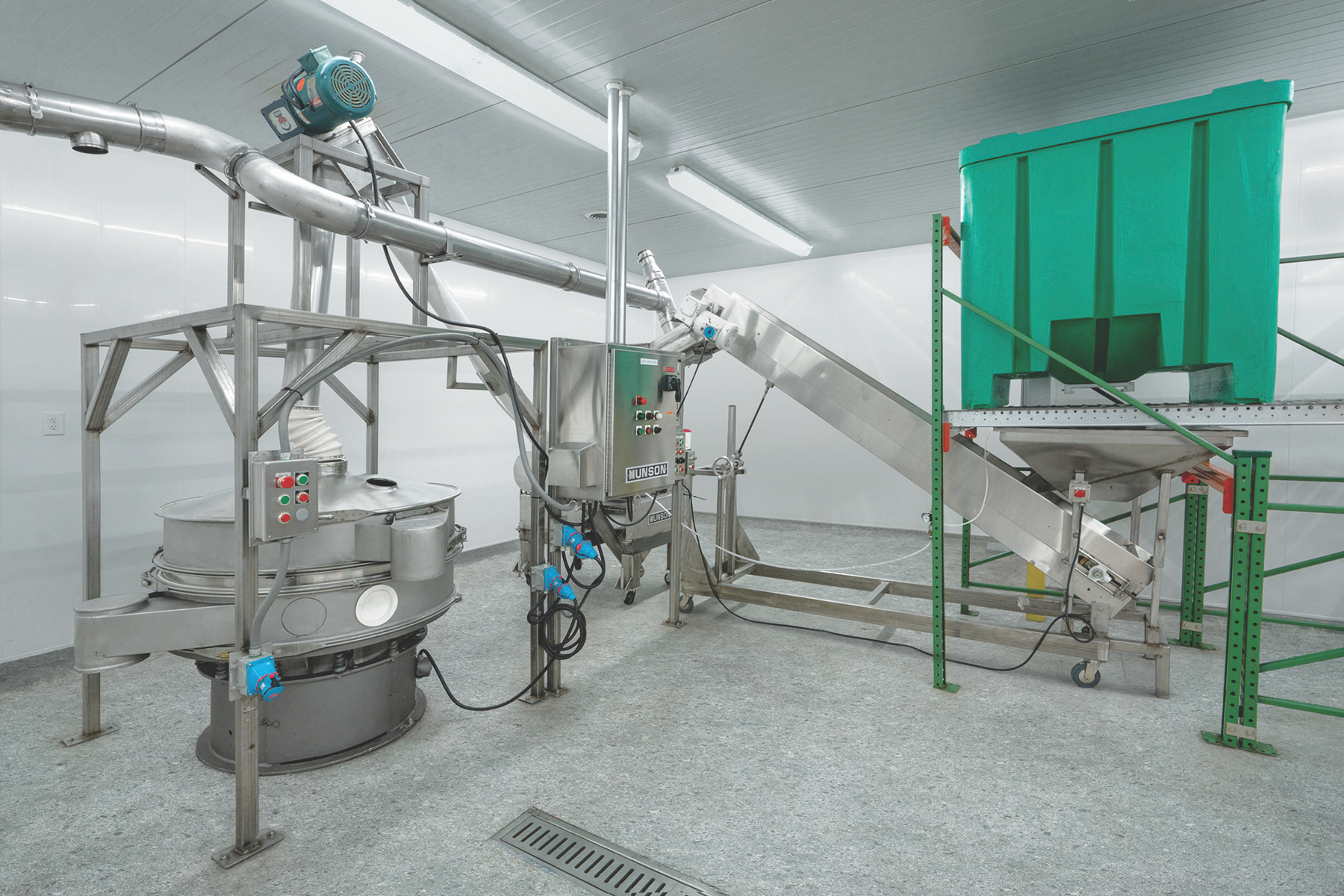 The Jewel Date Company air-dries its dates and then conveys the hardened dates to the Munson screen classifying cutter for size reduction. Photo courtesy of Munson Machinery Company, Inc.