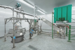 The Jewel Date Company air-dries its dates and then conveys the hardened dates to the Munson screen classifying cutter for size reduction. Photo courtesy of Munson Machinery Company, Inc.