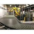 At a speed of 2.5 layers/min, the robot picks a full layer of jars from a pallet and places it on the filling line infeed.