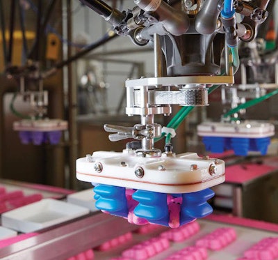 Peeps are loaded into trays by the JLS Talon robotic pick-and-place system, featuring ABB FlexPicker vision-guided robots and Soft Robotics gripper EOATs.