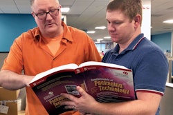 PepsiCo professionals Adam Avis (above left) and Stephen Tyner study IoPP’s Certified Packaging Professional text.