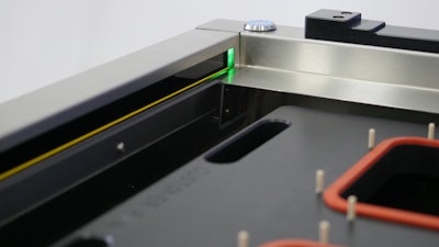 Belco added a light curtain to be able to detect whether a hand or package has been placed in an unsafe area in the moving zone of the machine.