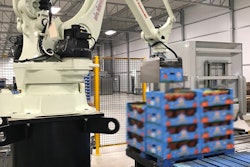 With new end-of-arm tooling designed by Caxton Mark, the Kawasaki palletizer is able to grab and stack boxes without crushing the fragile tomatoes inside.