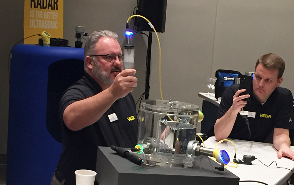 Vega&rsquo;s Greg Kline demonstrates how the presence of foam can cause a color shift on the company&rsquo;s 360-degree color display, making it easy to see when the status has changed.