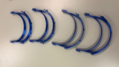 Spee-Dee is 3D printing critical parts for medical-use face masks, like these headbands that will hold the clear shields.