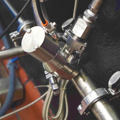 The TrueClean air blow check valve installed on a honey-recirculating line.