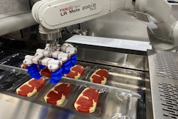 Quest developed a flexible robotic system to load meat and poultry into an Ossid ReeForm E40 thermoformer.