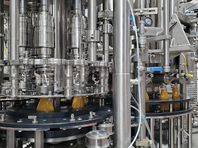 The 14-head filler and 6-station capper (shown) accept an impressive variety of bottle types (shown below left) as well as either a threaded or lug closure.