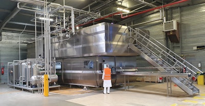 Hiperbaric’s 525 in-bulk machine processes twice the amount of beverage product per cycle than traditional in-pack HPP equipment.
