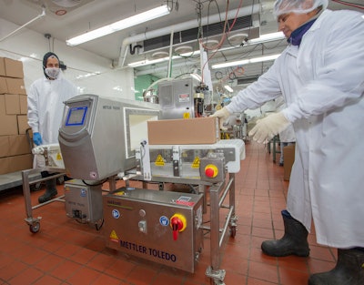 A semi-automated Profile Advantage metal detector at Longhini Sausage Company inspects cases filled with products that weren’t inspected by the inline metal detector system.