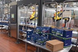From Cabrio Case to stackable club store to regular brown kraft corrugated shipper, the end-of-line equipment in Fisher Nuts’ new line handles it all. Behind the cases is the LSP-100 robotic case loader.