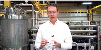 Eric Gore, technical director at Central States Industrial, demonstrates the creation of bubbles forming in a syringe when the plunger is pulled back (lowering the pressure in the system).