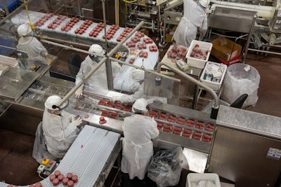 Smithfield moved quickly at the outset of COVID-19 to implement protocols mitigating the risk of viral transmission by employing barriers, masks and shields, and enhanced air purification systems across its facilities. Photo courtesy of Smithfield Foods.